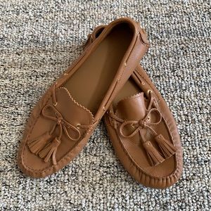 Coach light brown moccasins.